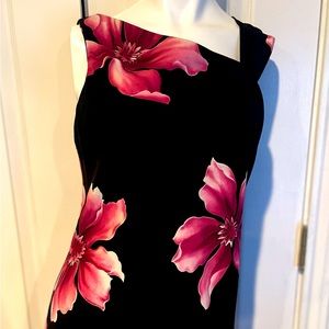 Woman’s beautiful dress. Dress black with pink flowers